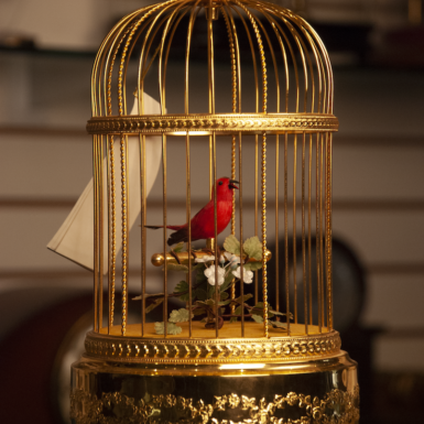 reuge gold plated singing bird cage automaton